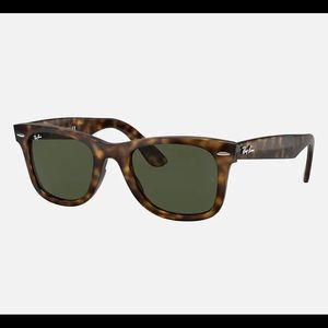 Classic tortoiseshell Ray Ban Wayfarer sunglasses.